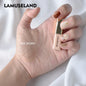 Blushimmer liquid concealer for eyes, showing a tube of makeup with a doe-foot applicator, designed to cover dark circles and blemishes.