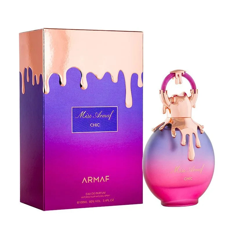 Blushimmer feminine fruity perfume bottle with elegant pink and gold design, showcasing a 100ml long-lasting, soft, sweet scent.