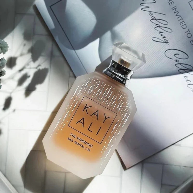 Blushimmer KAYALI 100ml women’s floral eau de parfum bottle with plum, jasmine, tuberose, vanilla, and suede scent highlighting elegant packaging