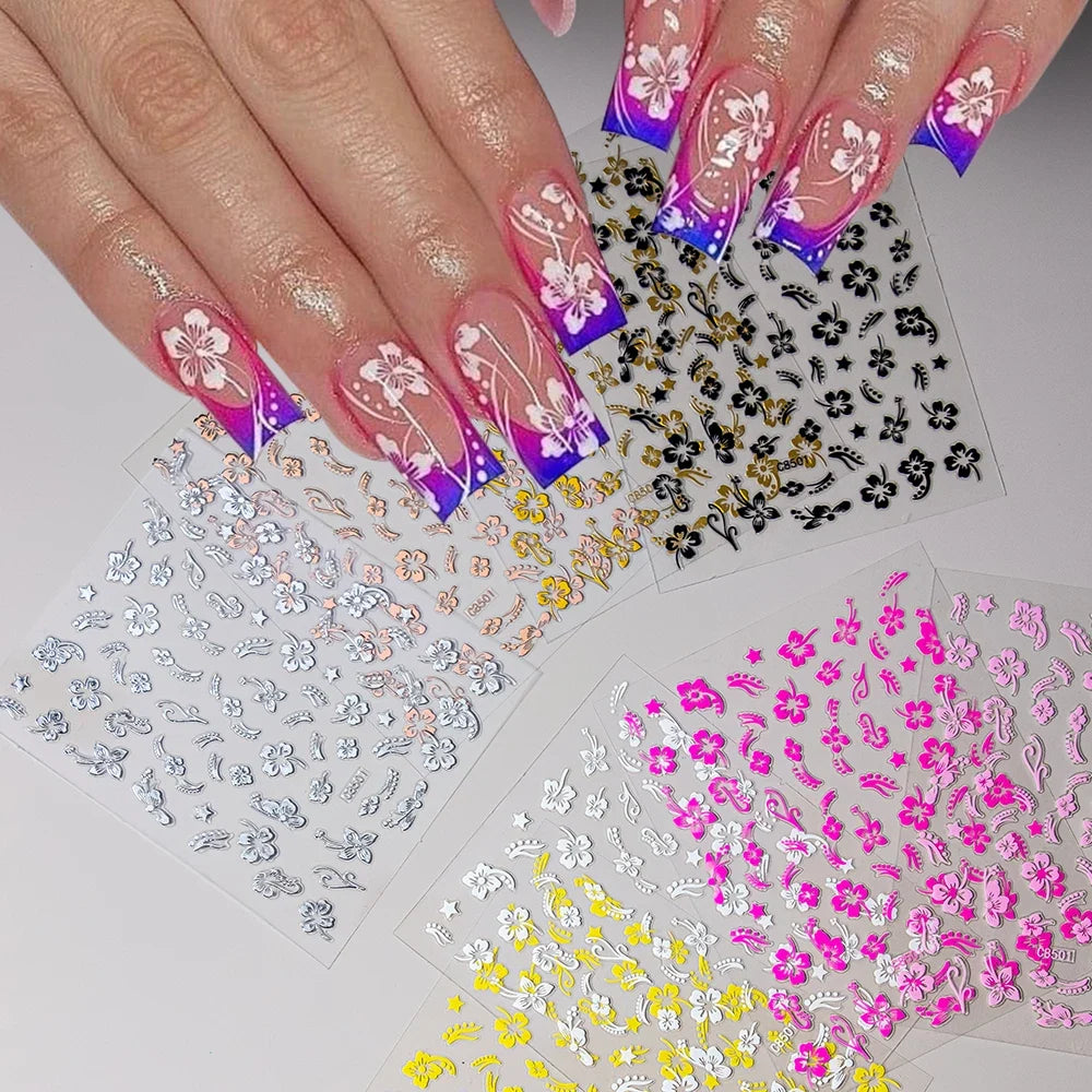 White and black 3D hibiscus flower nail sticker by Blushimmer featuring pink and gold floral decals for nail art decoration.