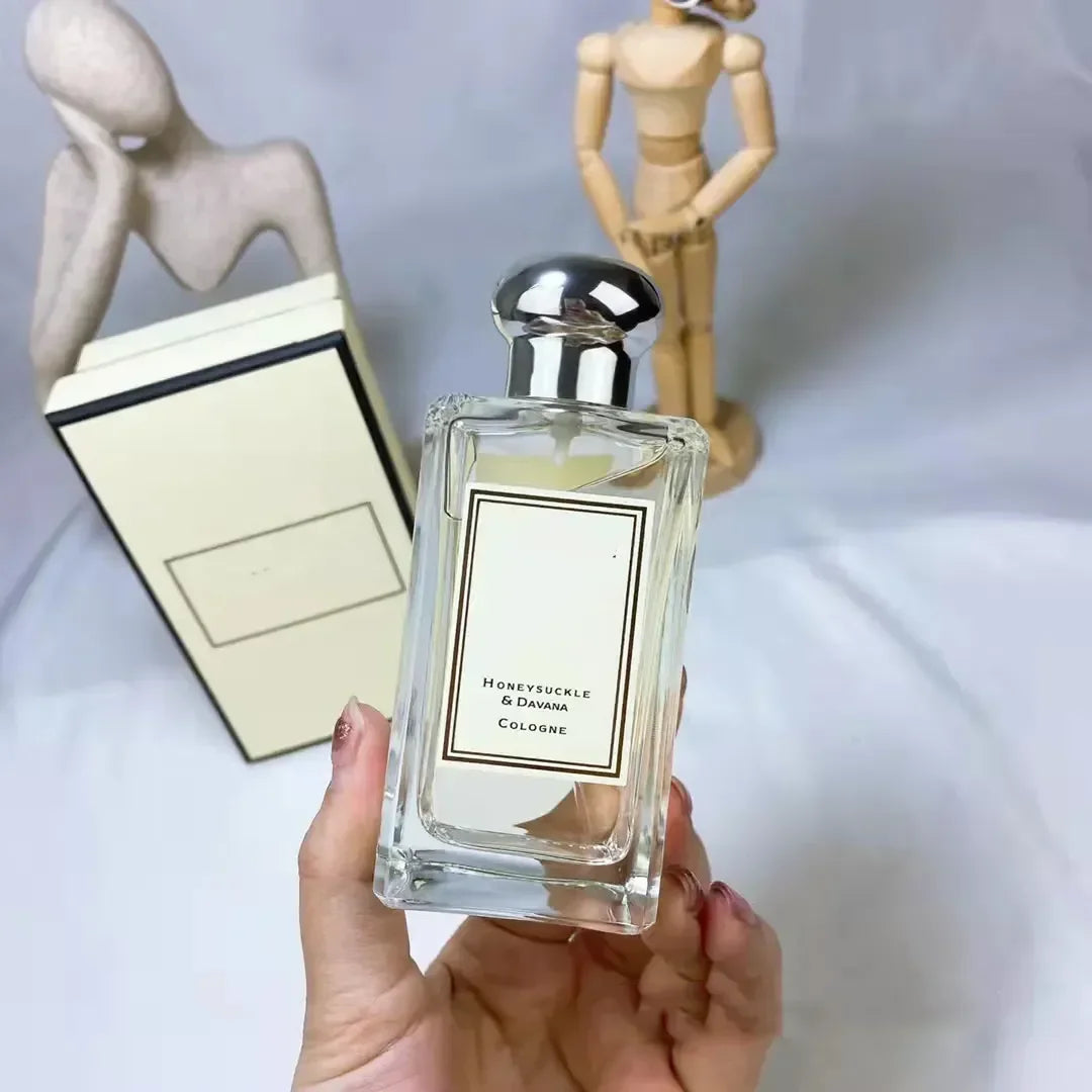 Blushimmer Daily Hot Perfume for Women and Unisex, 100ml natural spray with long-lasting blossom fragrance, shown in sleek bottle.
