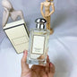 Blushimmer Daily Hot Perfume for Women and Unisex, 100ml natural spray with long-lasting blossom fragrance, shown in sleek bottle.