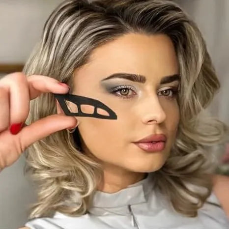Blushimmer Eyetour Your Glam Bestie eye makeup stencil for beginners, showing a clear plastic template with eye shapes for easy makeup application.