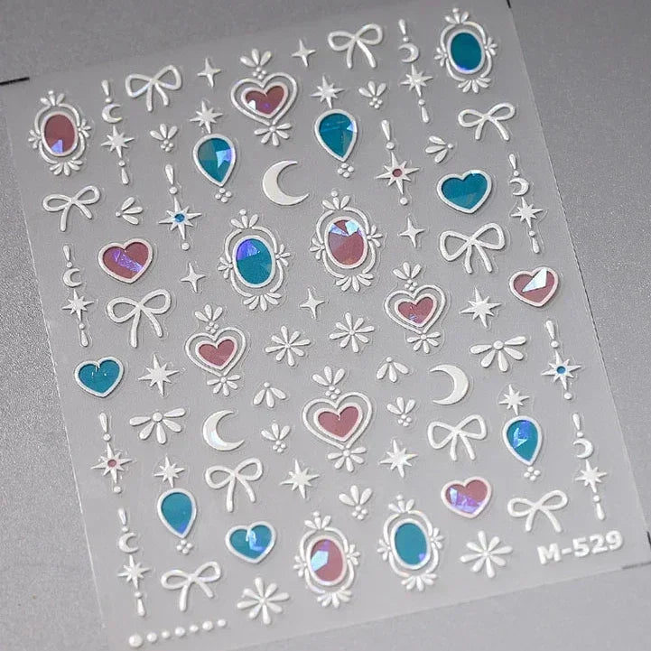 Colorful Cat's Eye 5D Gradient European love heart gem nail art stickers with geometric wing designs for manicure decoration.