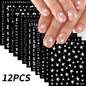 12pcs Blushimmer bronzing laser star nail stickers with 3D alphabet, heart, flower designs for DIY gradient manicure art.