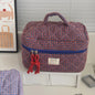 Pink Blushimmer Airfriend makeup bag with soft, compact design, ideal for cosmetics and toiletries on women's travel.