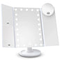 Blushimmer vanity makeup mirror with LED lights, 2x/3x/10x magnification, touch control, portable tri-fold design.