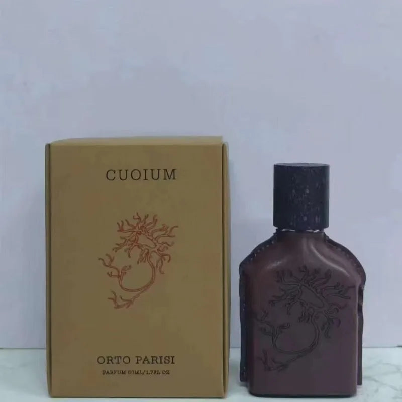 Unisex oriental woody perfume by Blushimmer, 50ml bottle featuring warm amber, soft musk, and earthy notes in elegant packaging.