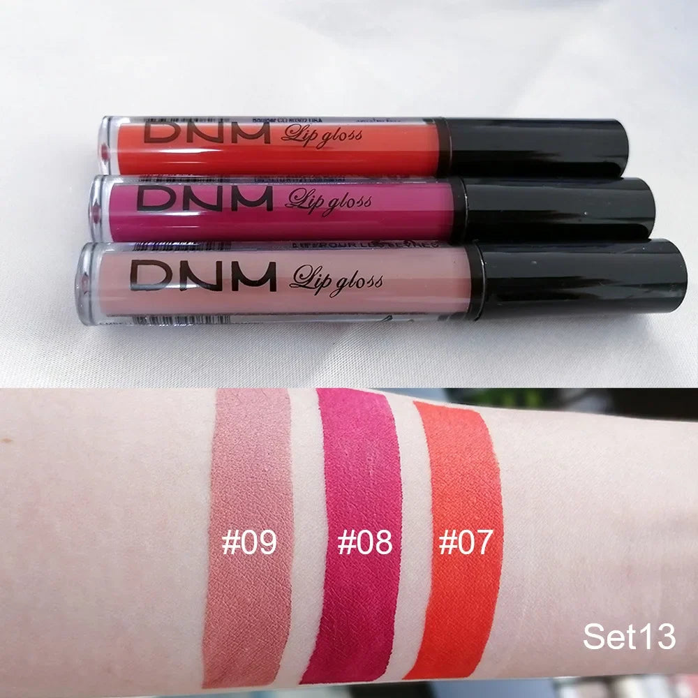 Set of three waterproof liquid lipsticks by Blushimmer in red, blue, purple, nude, and matte finishes for long-lasting makeup looks.