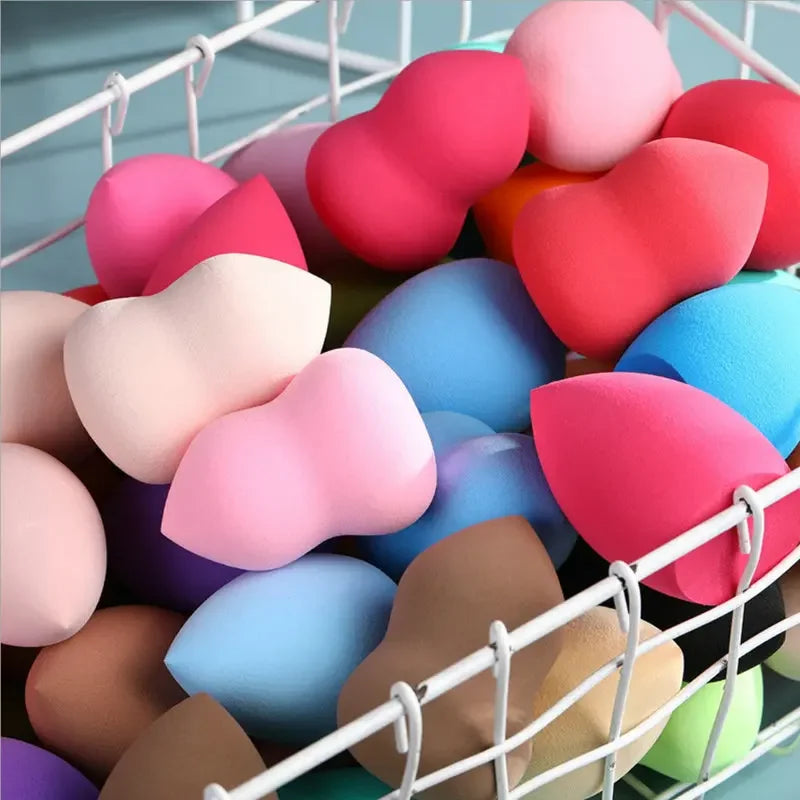 Set of 100/50/20/10 Blushimmer makeup sponges and puffs, soft egg-shaped cosmetic blenders for foundation and air cushion application.