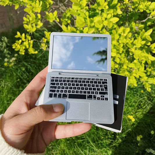 Blushimmer portable mini computer-shaped foldable makeup mirror with high-quality laptop design, compact for beauty and makeup use.