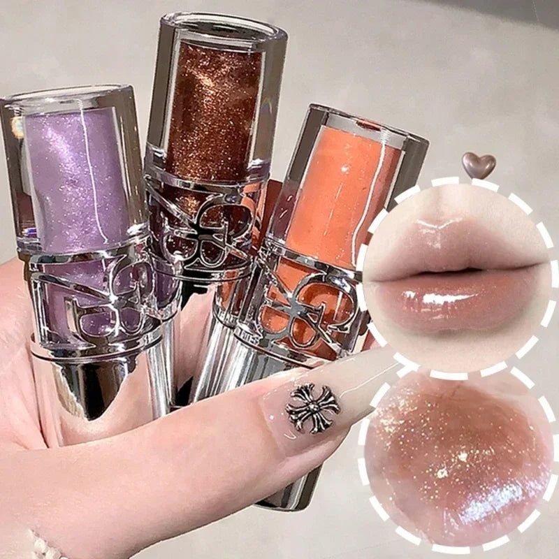 Blushimmer clear glass shine lip gloss with a watery, moisturizing texture and juicy, long-lasting tint in a sleek tube.