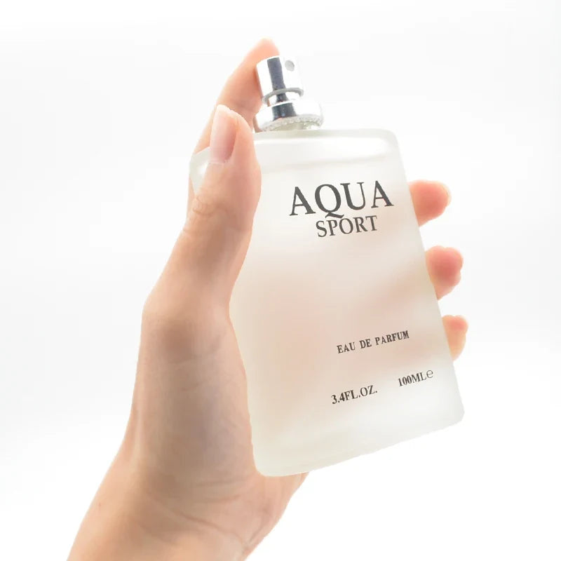 Blushimmer AQUA men's EDP perfume 100ml with aquatic, fresh lime, musk, and ocean fragrance in a sleek spray bottle.