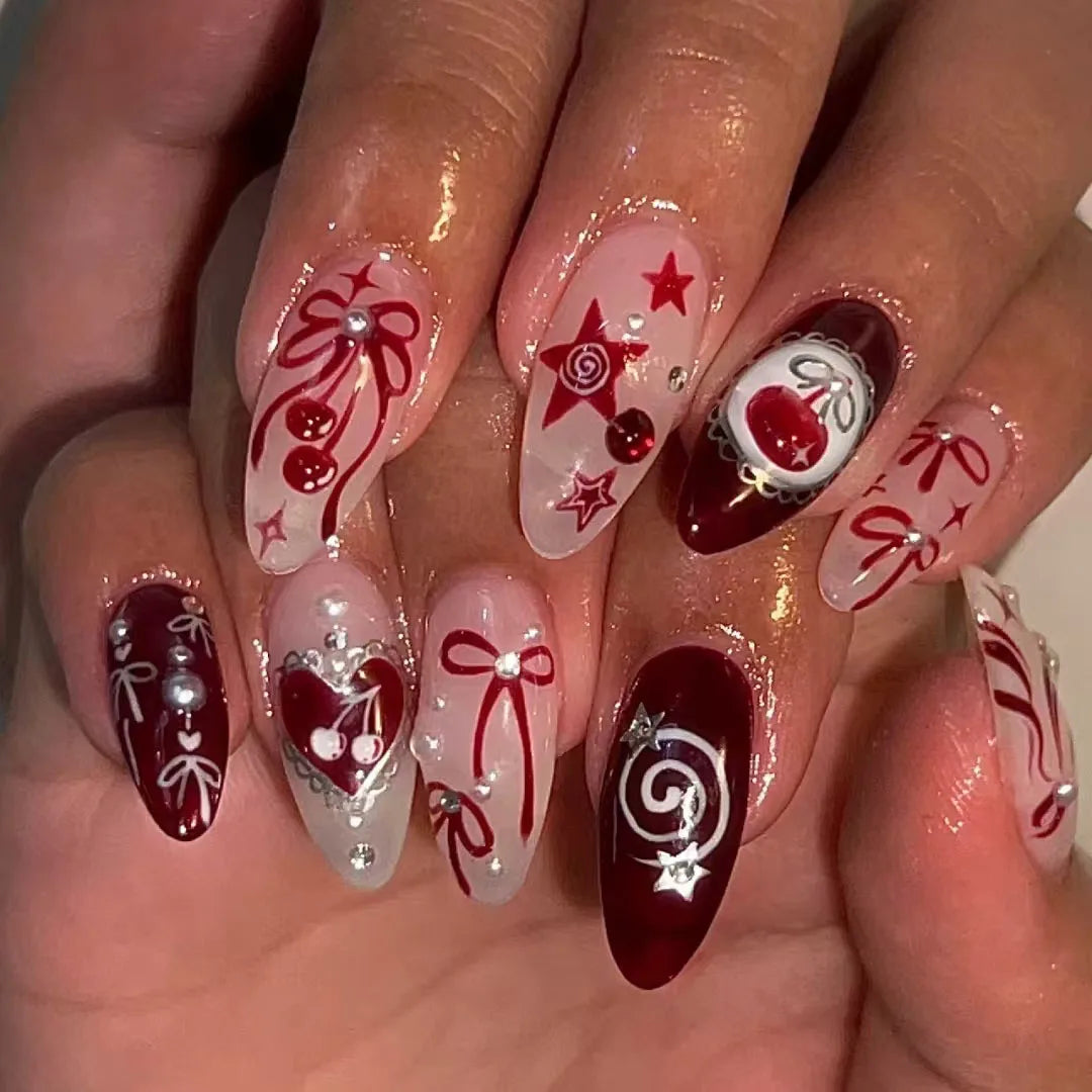 Set of 24 Blushimmer wine red almond press-on nails with cartoon rabbit, bowknot, plaid, pearl designs, and French style.