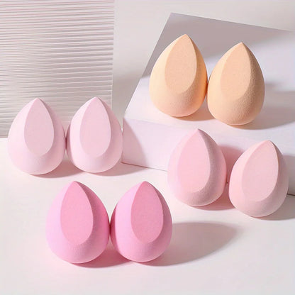Set of 8 pink Blushimmer makeup sponges, hydrophilic latex-free blenders for foundation, powder, and cream application.