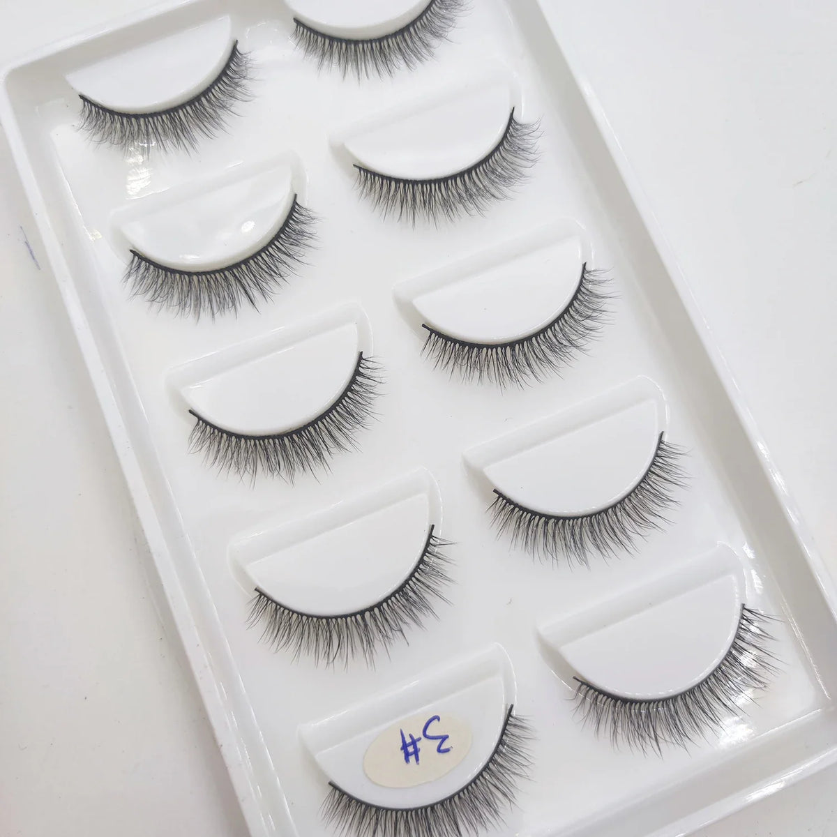 Set of 5 pairs of natural 3D mink false eyelashes by Blushimmer, perfect for makeup and beauty enhancement.