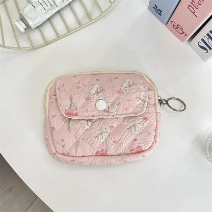 Blushimmer cute cartoon small travel cosmetic bag with lipstick, earphone, card storage, and makeup organizer for women.