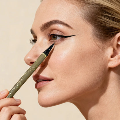 Black waterproof liquid eyeliner pen with a fine tip from Blushimmer, designed for precise and long-lasting eye makeup.
