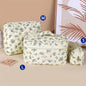 Cute quilted cotton makeup bag by Blushimmer with zipper closure, portable cloth cosmetic organizer for women and girls.