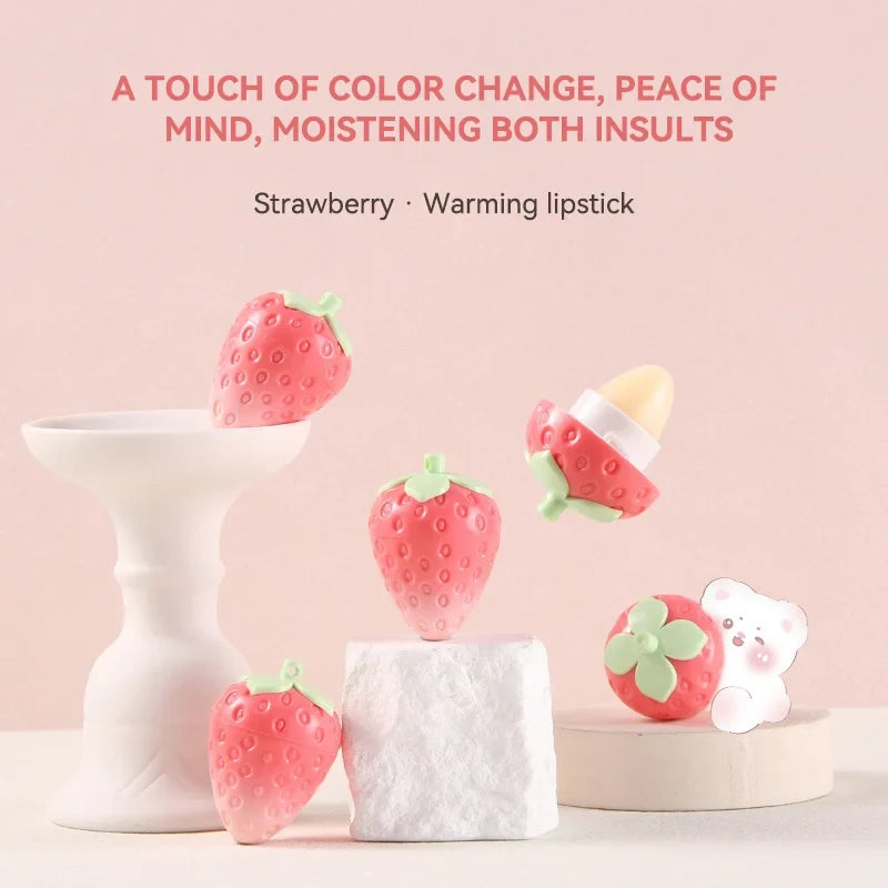 Blushimmer Shiji Strawberry lip balm showing the sleek tube with a pink cap and clear label, perfect for hydration and lip protection.