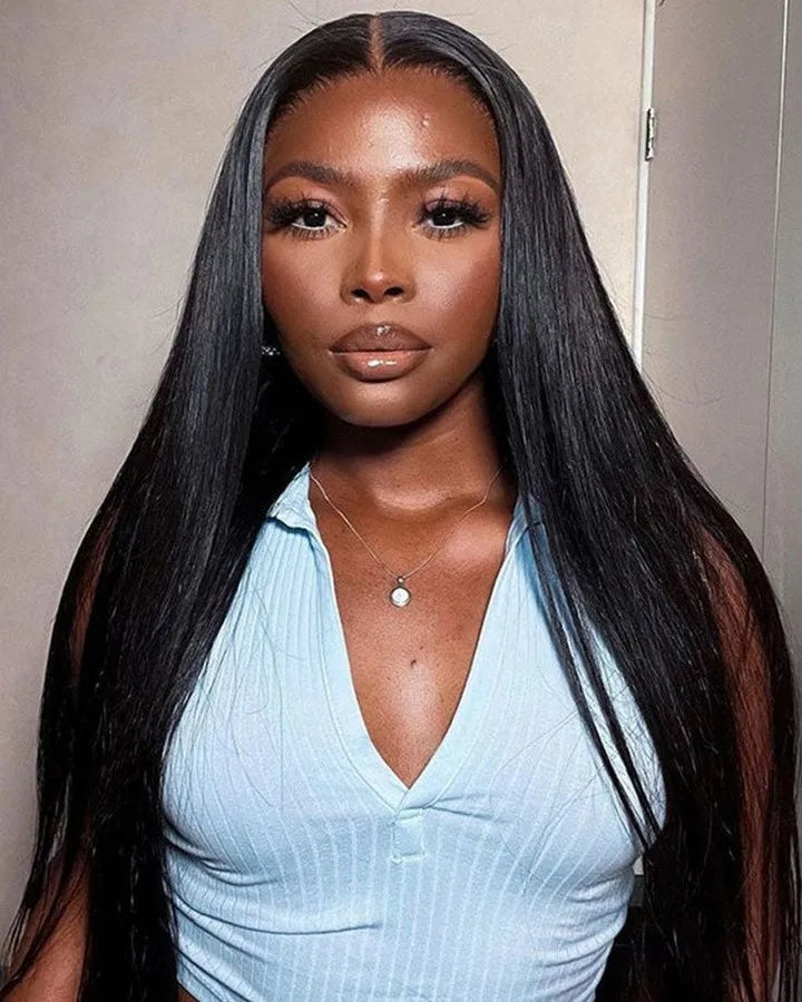 Brazilian 100% human hair wig with 13x4 transparent lace frontal, bone straight, 40 inches, glueless, pre-plucked, high density.
