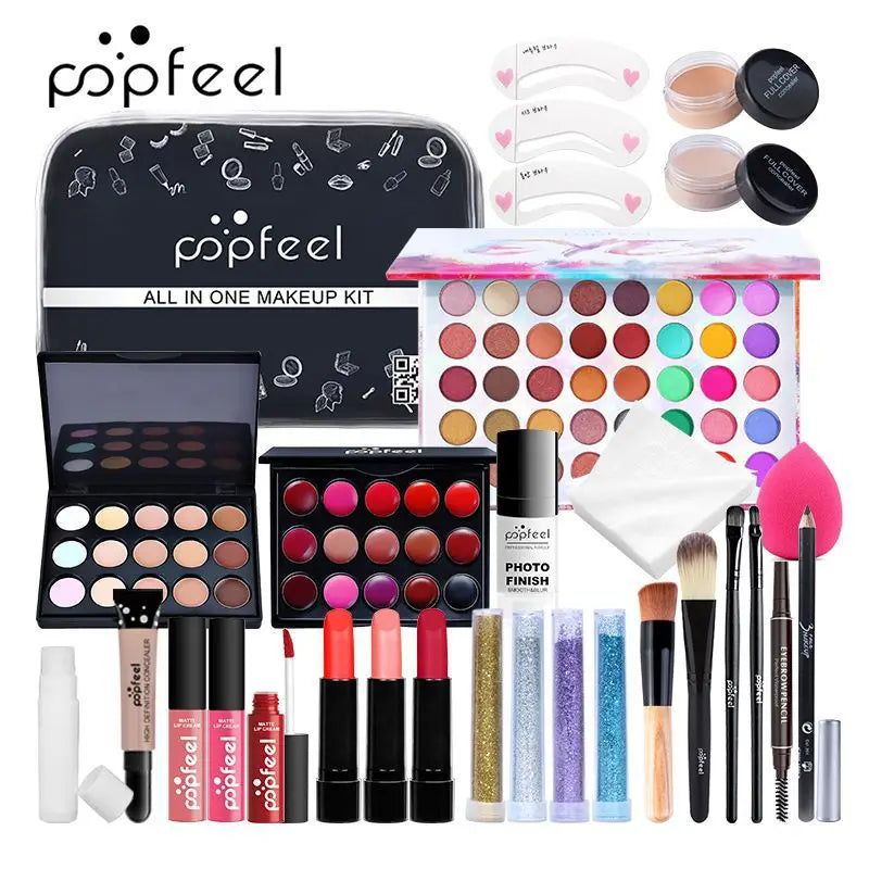 Blushimmer All-in-One Makeup Kit gift set including eyeshadow palette, foundation, lip gloss, blush, brushes, and eyeliner.