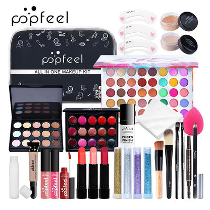 Blushimmer All-in-One Makeup Kit gift set including eyeshadow palette, foundation, lip gloss, blush, brushes, and eyeliner.