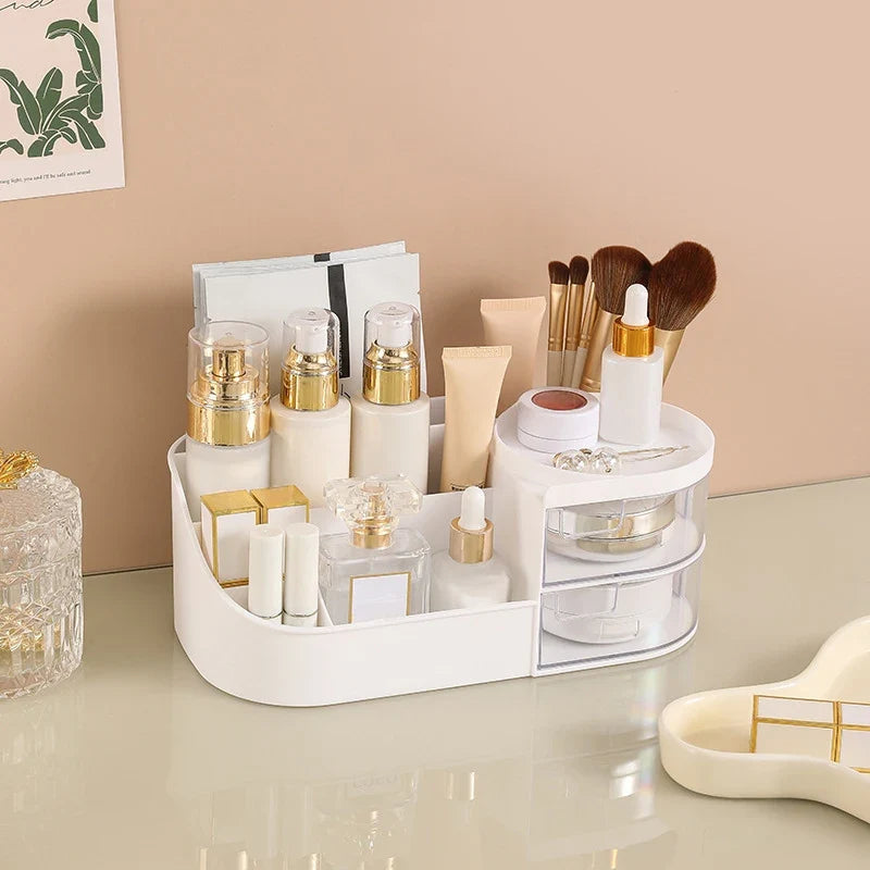 Blushimmer makeup storage box with compartments for cosmetics, jewelry, nail polish, and small dorm room essentials on desktop