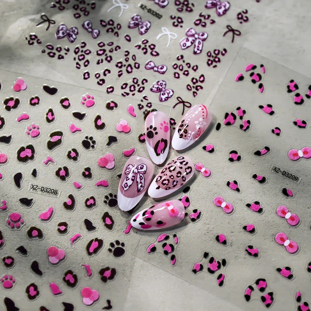 Pink and black 5D leopard print nail art stickers by Blushimmer, featuring 8x10cm sheet of adhesive leopard nail decals for DIY manicure.