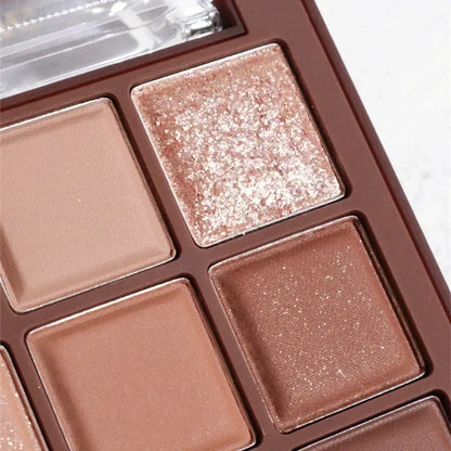 Blushimmer chocolate eye shadow palette with nine pearly matte and shiny sequin earth tones for versatile eye makeup looks.