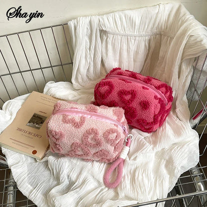 Soft plush makeup bag with handle, love print design, portable cosmetic storage and pencil pouch, by Blushimmer.