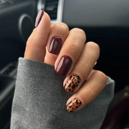 Blushimmer 3D bowknot pearl leopard French nude almond fake nails with detachable design and intricate nail art detail.