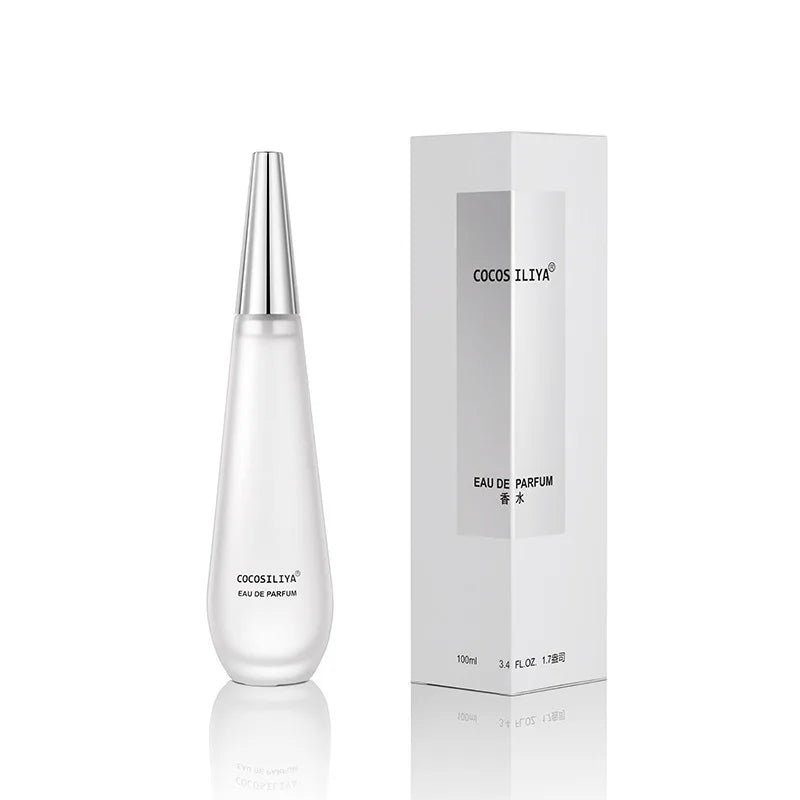 Elegant floral Eau de Parfum bottle by Blushimmer featuring lotus, rose, peony, amber, and musk with fresh, long-lasting floral woody scent.
