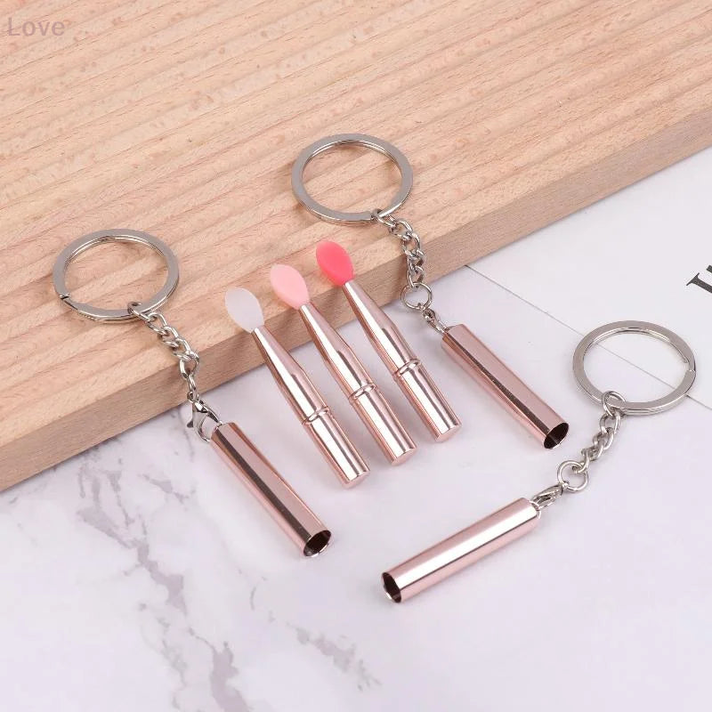 Blushimmer multifunctional silicone lip brush with cover and keychain, ideal for applying lipstick and eye shadow on the go.