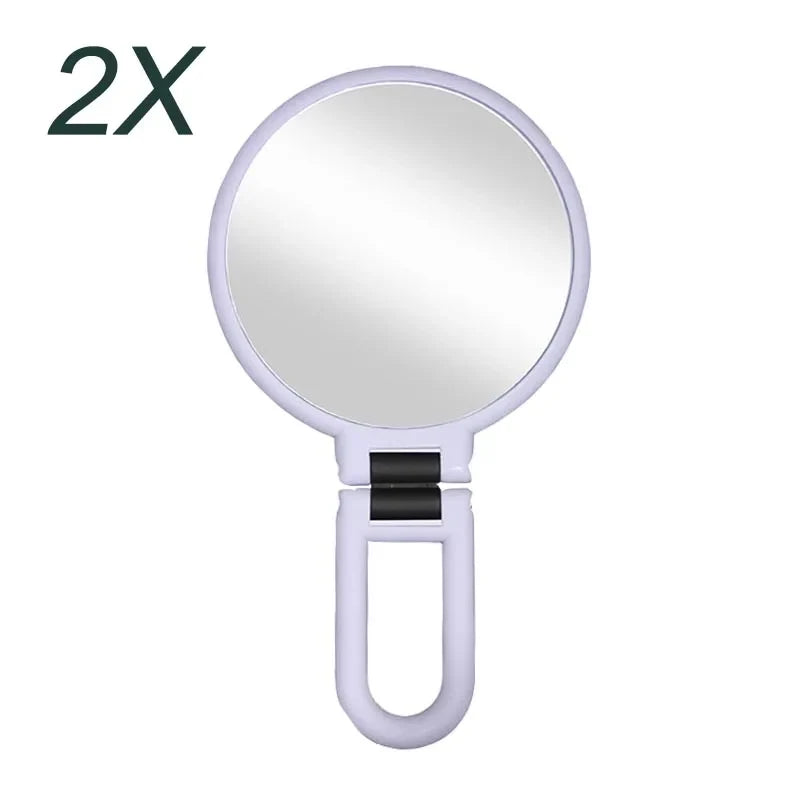 Blushimmer pocket magnifying makeup mirror with 2x, 5x, 10x, or 15x zoom, small foldable design for women’s tabletop use.