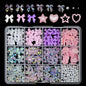 Assorted 3D gold bow and butterfly nail charms from Blushimmer, shiny metal nail art jewelry for luxury nail designs.