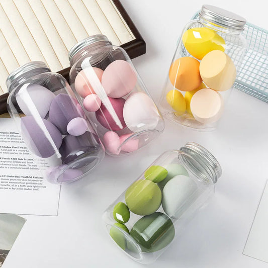 Set of 14 Blushimmer makeup sponges with velvet texture, storage jar, beauty eggs, and powder puffs for makeup application.