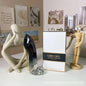 Elegant 80ml Blushimmer women's floral perfume bottle with high heel design, showcasing a luxurious and stylish fragrance spray.