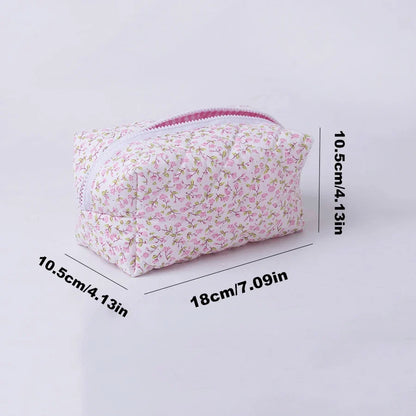 Blushimmer floral quilted makeup bag with puffy design, large travel cosmetic pouch with flower print and multiple compartments.