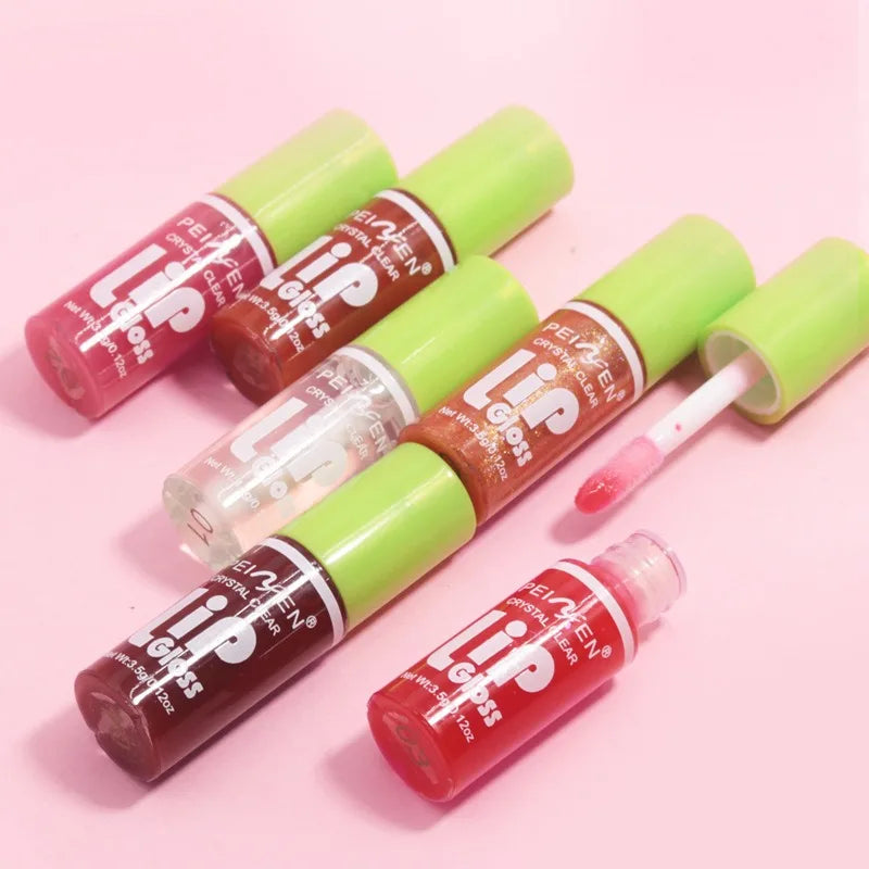 Set of 6 Blushimmer moisturizing lip glosses with transparent lip oil, hydrating lip glaze, and lip plumper for shiny, smooth lips.