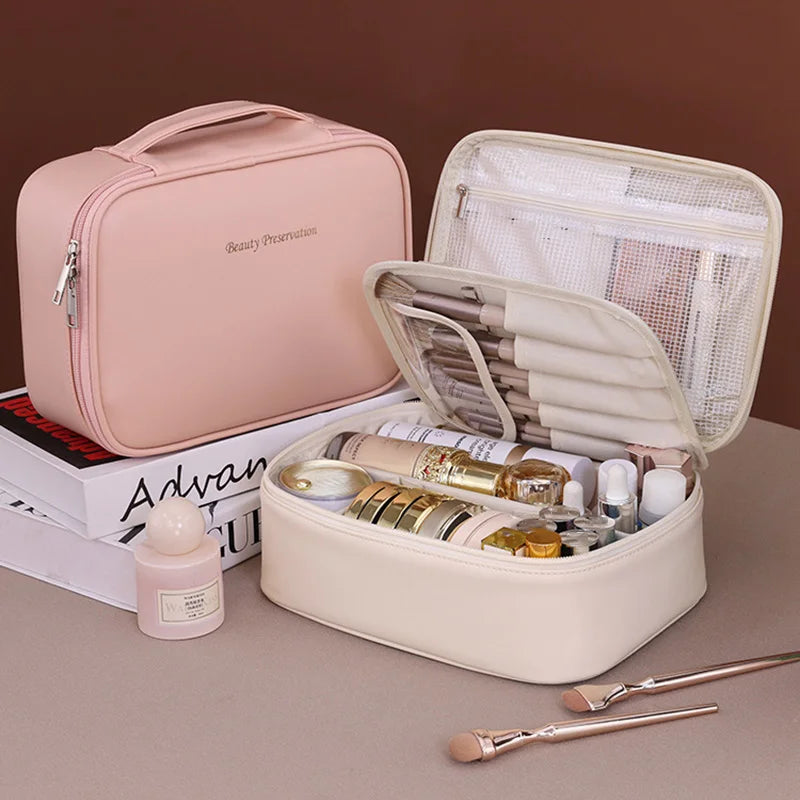 Wholesale Blushimmer PU large capacity tote makeup bag with double layers, travel organizer, and cosmetic storage for women.