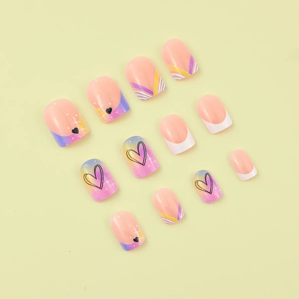 Set of 24 Blushimmer short square fake nails with halo dyed gradient hearts and colorful French tips for stylish nail art.