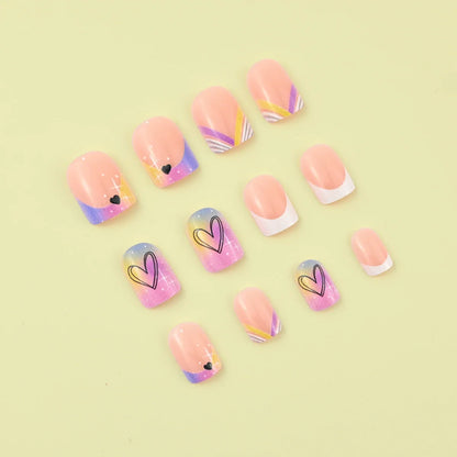 Set of 24 Blushimmer short square fake nails with halo dyed gradient hearts and colorful French tips for stylish nail art.