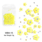 White acrylic flower nail art decorations with red and blue rhinestones for DIY manicure, from Blushimmer, in 5g package.