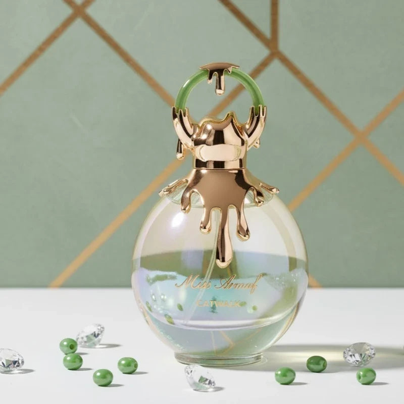 Blushimmer feminine fruity perfume bottle, 100ml, with soft, sweet, bright aroma and elegant lush design.