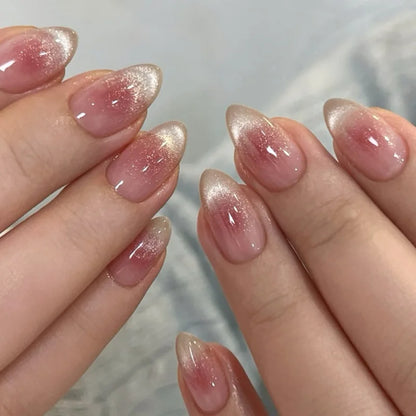 Set of 24 glossy red cat's eye press on nails by Blushimmer, almond-shaped false nails with nude color and decorative charms.