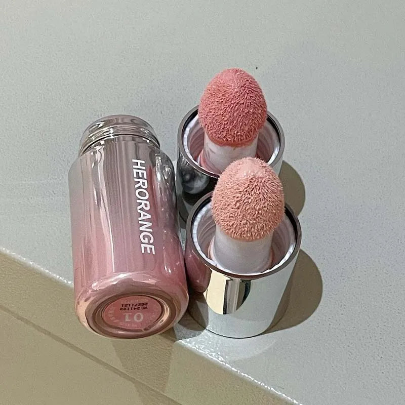 Blushimmer HERORANGE liquid blush in a natural, low-saturation matte shade, designed to enhance a natural complexion.