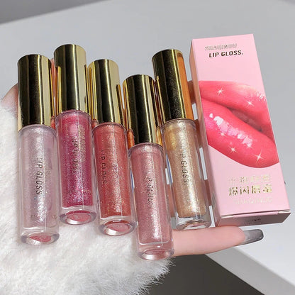 Blushimmer water-glossy lip gloss with sparkling finish, moisturizing lip oil for a plump, shiny, and hydrated pout.