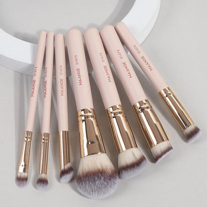 Set of seven Blushimmer makeup brushes with soft bristles for foundation, powder, concealer, and blush application.