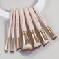 Set of seven Blushimmer makeup brushes with soft bristles for foundation, powder, concealer, and blush application.